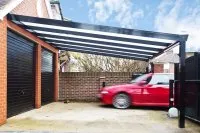 Vignette de l'article : Carport, appentis, préau, ou abri de voiture : permis de construire ou déclaration préalable ?